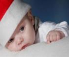 Мальчик с шляпы Санта-Клауса